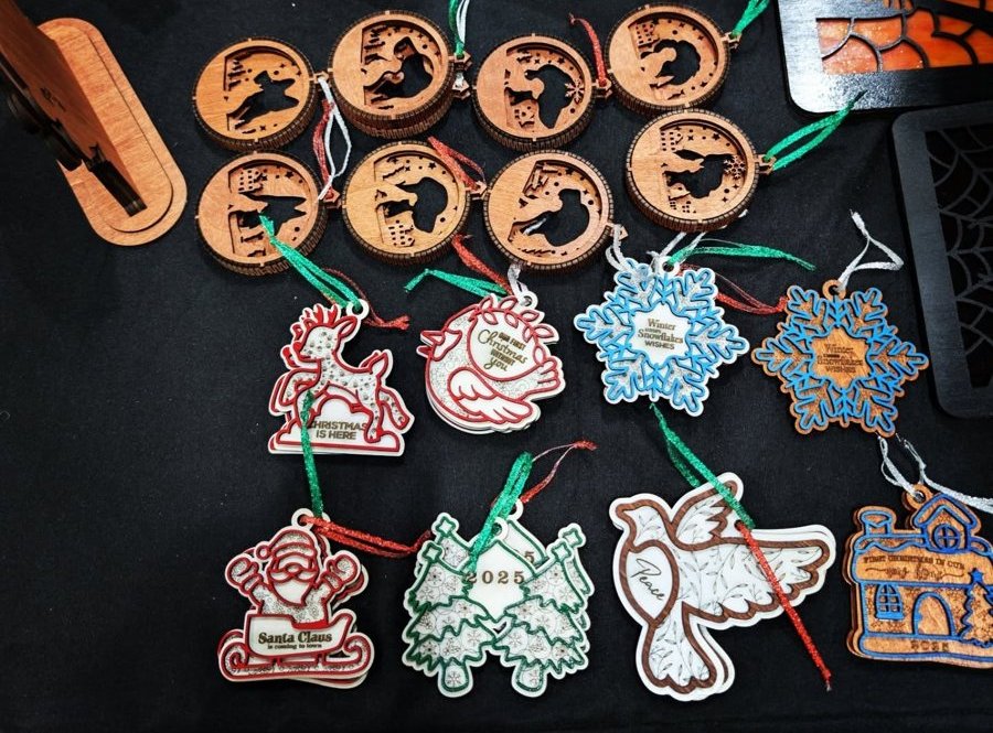 Wood Christmas ornaments: snowflakes, reindeer, Santa, trees, a dove and round scene ornaments