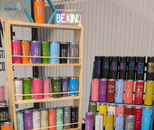 Shelves of laser-etched 20oz tumblers in many colors